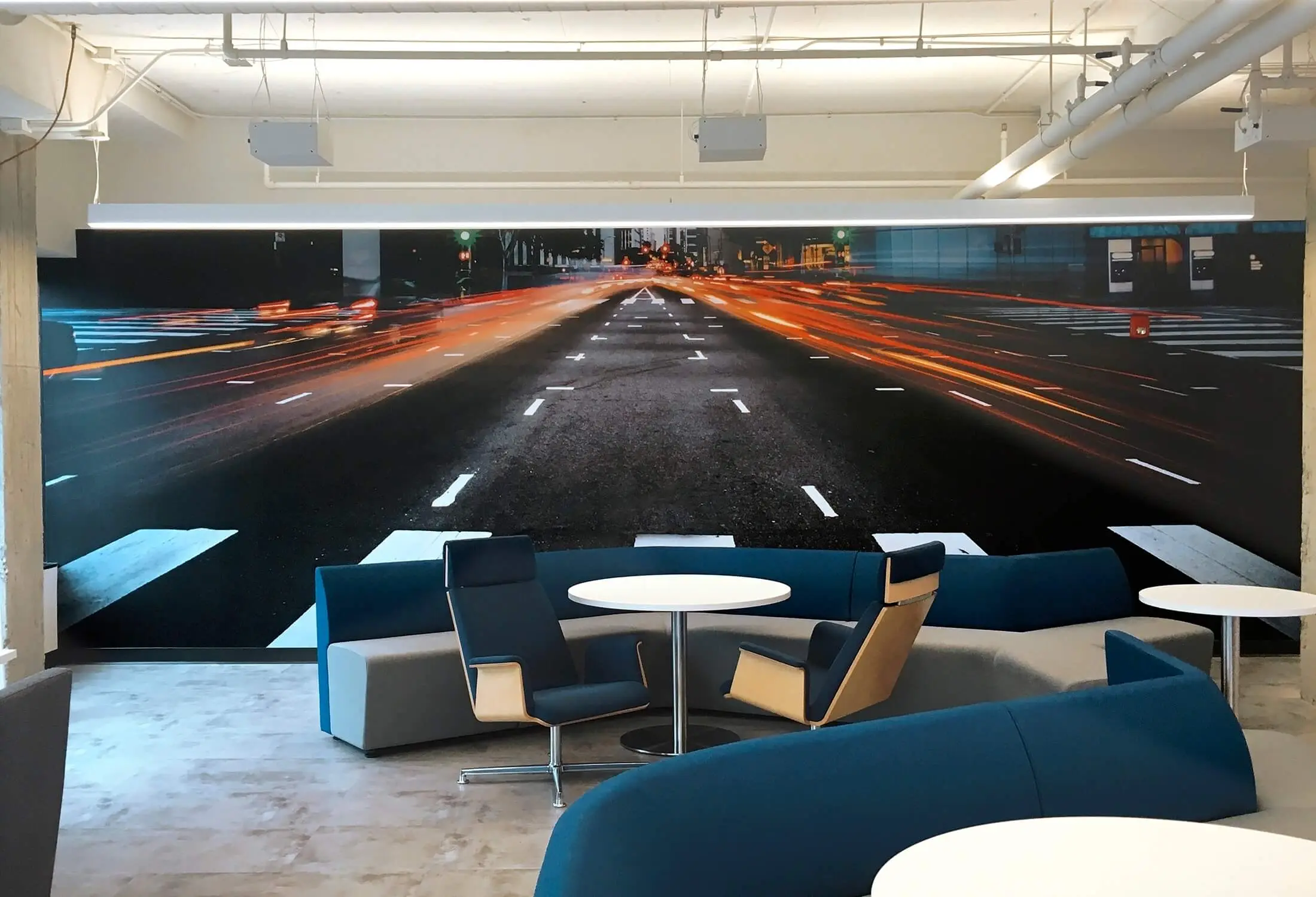 Lounge with a night highway mural