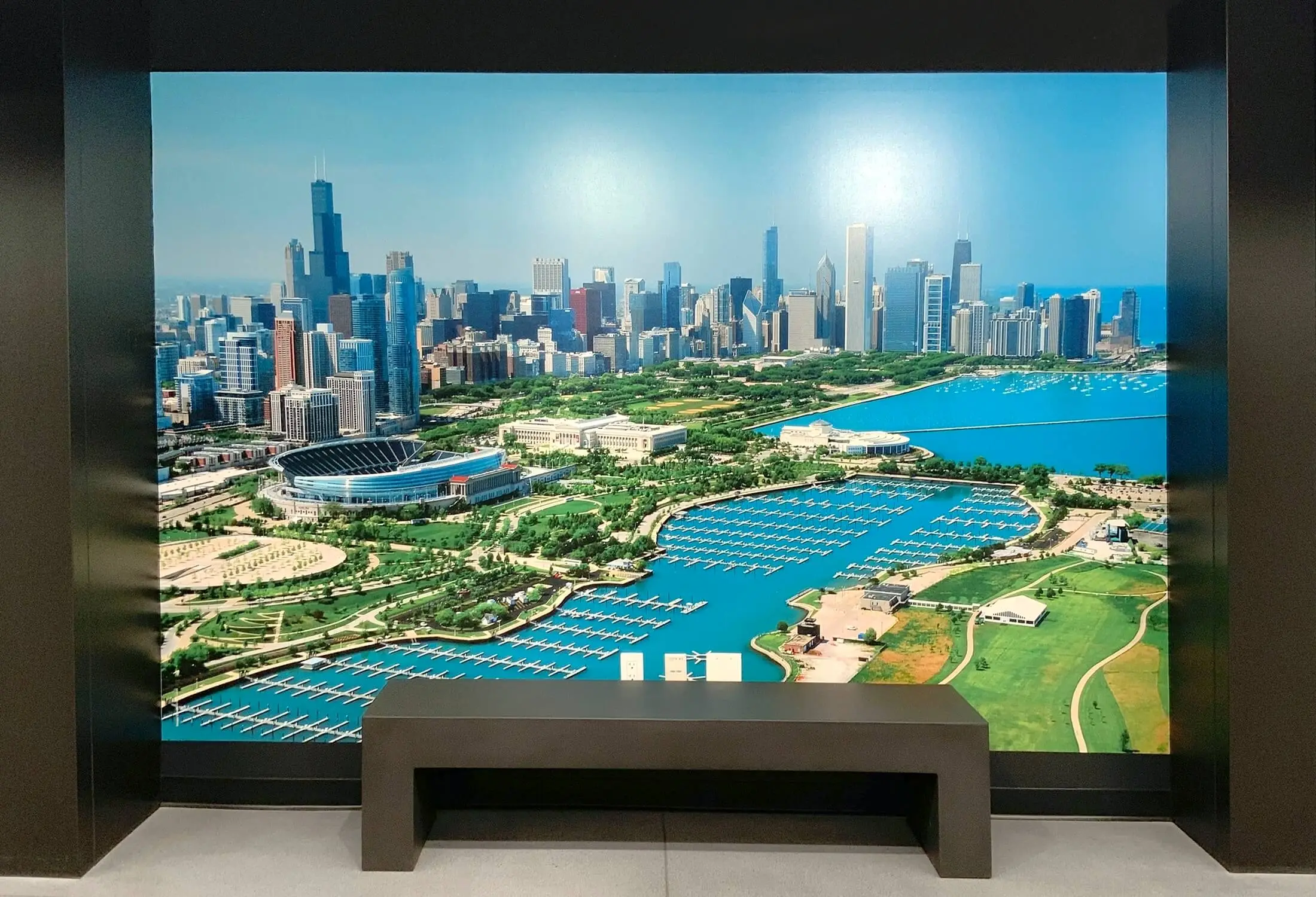 Aerial Chicago lakefront mural with bench